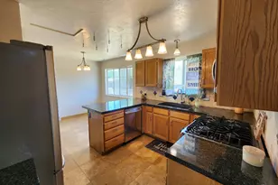 6043 W Parkham Way, Kearns, UT 84118 - Photo 11