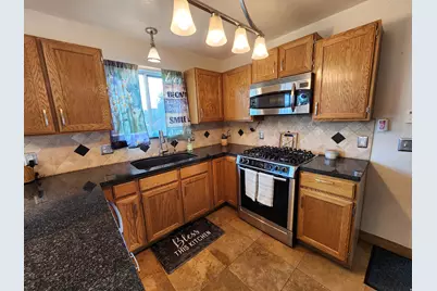 6043 W Parkham Way, Kearns, UT 84118 - Photo 9