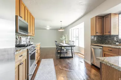 3063 W Holdershill Ln, Taylorsville, UT 84129 - Photo 9