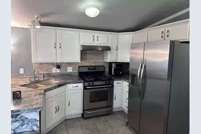 3669 S Willow Hollow Rd W, West Valley, UT 84119 - Photo 7