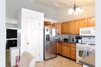 5707 S Esprit Dr W, Kearns, UT 84118 - Photo 11