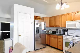 5707 S Esprit Dr W, Kearns, UT 84118 - Photo 11