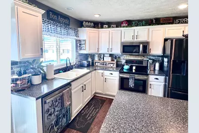 6935 W Dalmation St, West Valley, UT 84128 - Photo 19