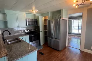 818 W Mount Tuscarora Dr, Taylorsville, UT 84123 - Photo 3