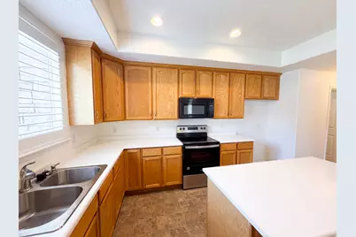 6943 W Bamburgh Way, West Valley, UT 84128 - Photo 15