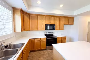 6943 W Bamburgh Way, West Valley, UT 84128 - Photo 15