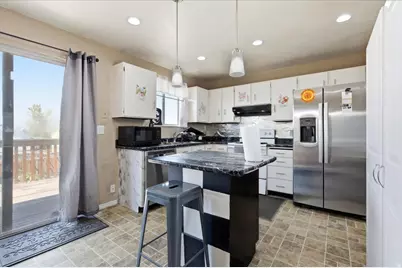 6130 W Powderwood Dr, West Valley, UT 84128 - Photo 3