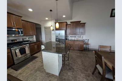 8775 S Millrace Cir, West Jordan, UT 84088 - Photo 7