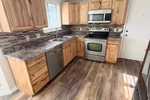 9571 S David St E, Sandy, UT 84070 - Photo 3