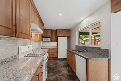 9297 S Sneddon Dr E, Sandy, UT 84070 - Photo 1
