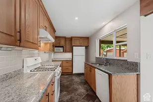 9297 S Sneddon Dr E, Sandy, UT 84070 - Photo 1