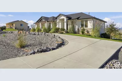 7707 N Cobblerock Rd, Lake Point, UT 84074 - Photo 5