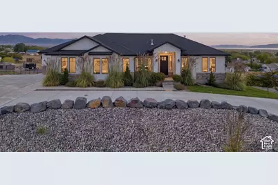 7707 N Cobblerock Rd, Lake Point, UT 84074 - Photo 1