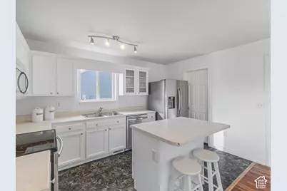3177 S Burdock Dr W, West Valley, UT 84128 - Photo 7