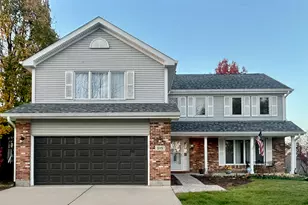 515 Cimarron Dr W, Aurora, IL 60504 - Photo 1