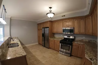 10765 Clocktower Drive #401, Countryside, IL 60525 - Photo 7