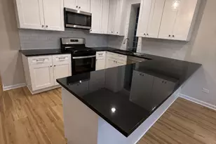5751 W Higgins Ave, Chicago, IL 60630 - Photo 5