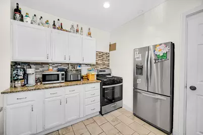 310 S 2nd Avenue N, Maywood, IL 60153 - Photo 9