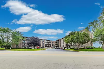 701 W Huntington Commons Road #418, Mount Prospect, IL 60056 - Photo 1