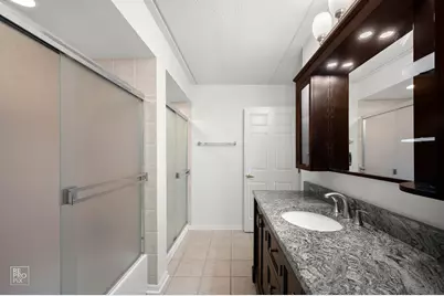 7041 W Touhy Avenue #406, Niles, IL 60714 - Photo 9