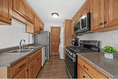1497 Woodcutter Unit D Lane #D, Wheaton, IL 60189 - Photo 19