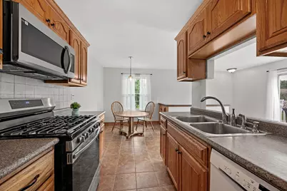 1497 Woodcutter Unit D Lane #D, Wheaton, IL 60189 - Photo 23