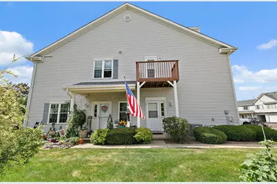 1073 Castleshire Drive #1073, Woodstock, IL 60098 - Photo 1