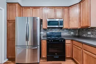 219 S Alder Creek Dr W, Romeoville, IL 60446 - Photo 9