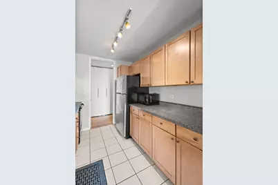 655 W Irving Park Road #702, Chicago, IL 60613 - Photo 9