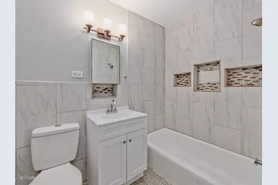7021 N Ridge Boulevard #1E, Chicago, IL 60645 - Photo 11