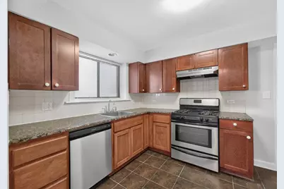 2710 W Lunt Avenue #107, Chicago, IL 60645 - Photo 11