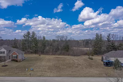 7701 Highlands Drive, Winnebago, IL 61088 - Photo 1