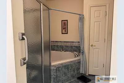 1113 Cedar Village Boulevard, East Brunswick Township, NJ 08816 - Photo 19