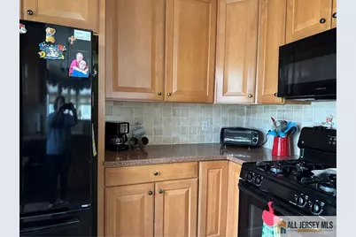 1113 Cedar Village Boulevard, East Brunswick Township, NJ 08816 - Photo 11