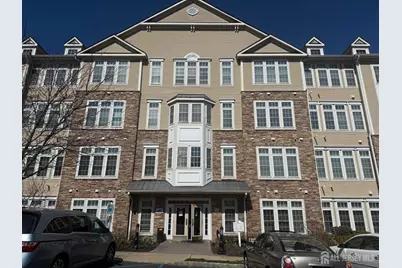 1304 Cedar Village Boulevard #304, East Brunswick Township, NJ 08816 - Photo 1