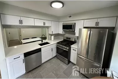 1204 Commons Drive #4, East Brunswick Township, NJ 08816 - Photo 1