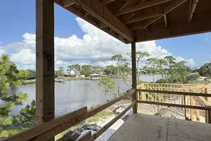 7910 S Lagoon Dr, Panama City Beach, FL 32408 - Photo 11