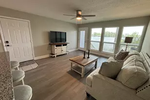 6909 N Lagoon Dr, Panama City Beach, FL 32408 - Photo 5