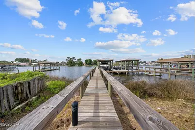 8597 N Lagoon Drive, Panama City Beach, FL 32408 - Photo 9