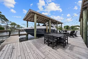 8597 N Lagoon Dr, Panama City Beach, FL 32408 - Photo 5