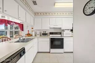 7813 N Lagoon Dr, Panama City Beach, FL 32408 - Photo 7