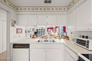 7813 N Lagoon Dr, Panama City Beach, FL 32408 - Photo 9