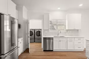 7009 N Lagoon Dr, Panama City Beach, FL 32408 - Photo 11