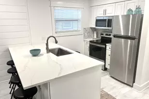 7813 N Lagoon Dr, Panama City, FL 32408 - Photo 33