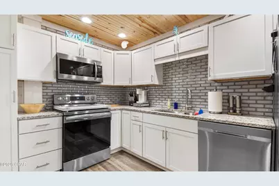 7013 S Lagoon Drive, Panama City Beach, FL 32408 - Photo 15
