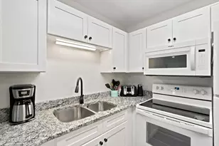 7125 N Lagoon Dr, Panama City Beach, FL 32408 - Photo 9
