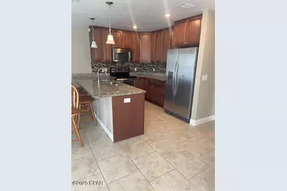 6498 N Lagoon Drive, Panama City Beach, FL 32408 - Photo 9