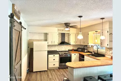 8908 N Lagoon Drive, Panama City, FL 32408 - Photo 11