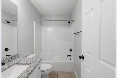 8418 N Lagoon Drive, Panama City, FL 32408 - Photo 19