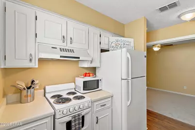 7813 N Lagoon Drive #4E, Panama City, FL 32408 - Photo 11